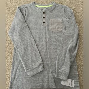 Carter’s‎ boys size 12 gray long sleeved shirt
Thermal new with tag